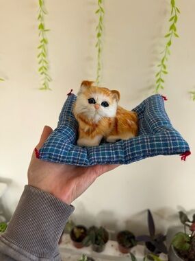 Small Orange Tabby Kitten Figurine on Blue Plaid Pillow